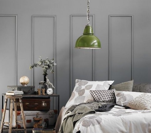 green industrial light in grey bedroom