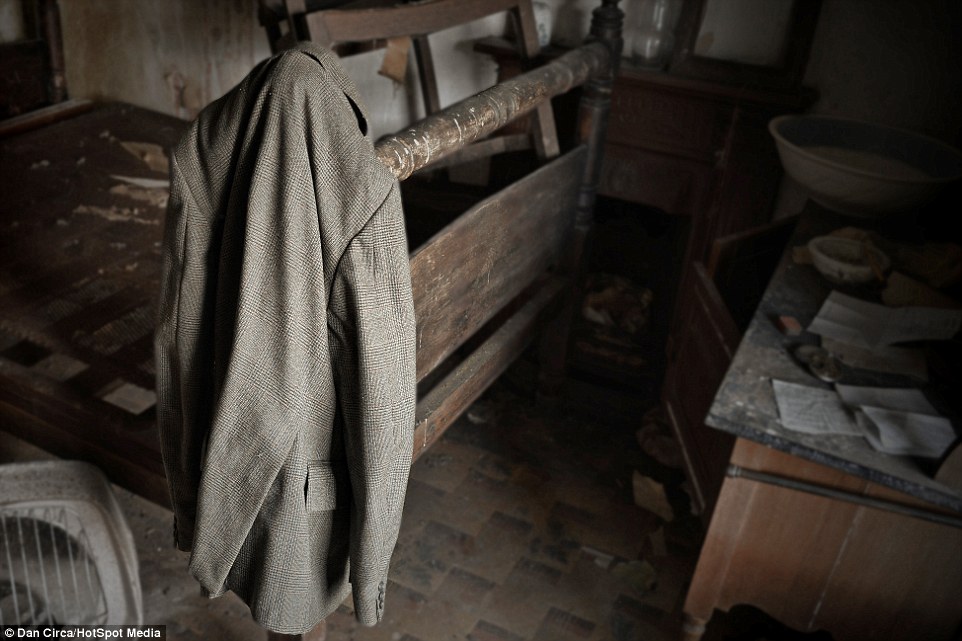 Cloud House Welsh farmhouse  jacket on bedstead DAN CIRCA