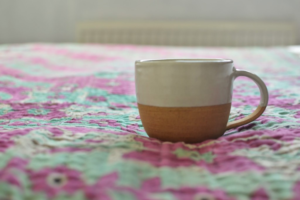 Decorator's Notebook terracotta mug and kantha in the home of Jen Little Birdie blog